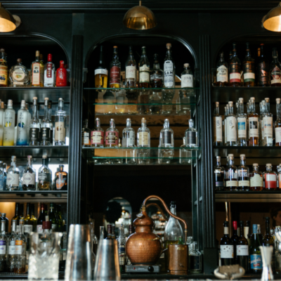 bottles on shelf at bar