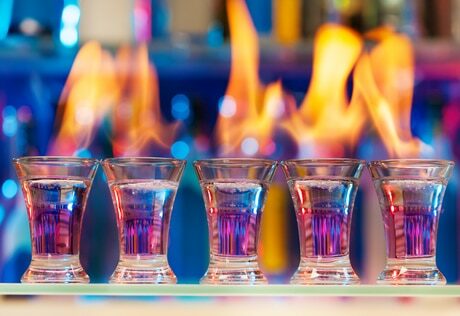 sambuca shot glasses on fire